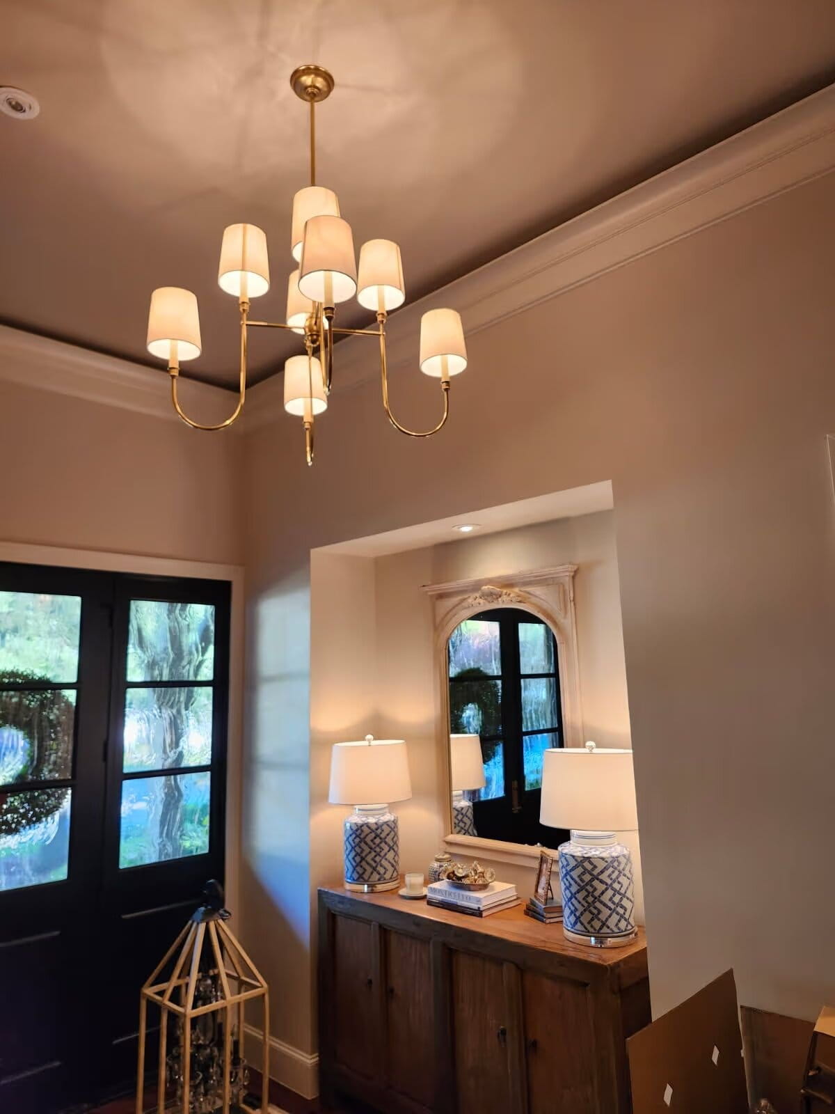 Elegant Chandelier Installation Enhances Living Space